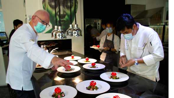 Chef Henk Savelberg plating the Forest Mushroom dessert