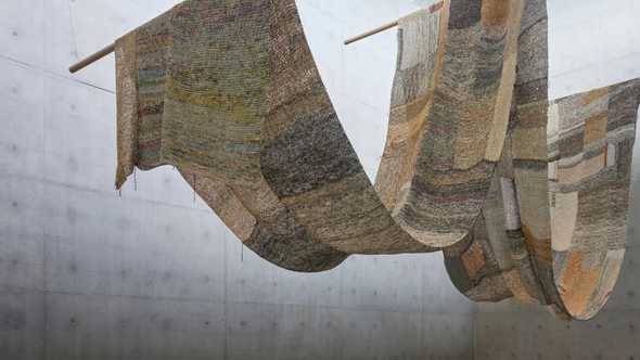 Knitting Conversations, a captivating knitted paper installation by Hong Kong artist Movana Chen