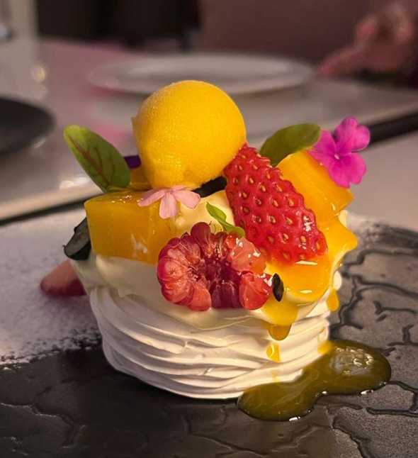 Pavlova, French meringue, seasonal fruit 