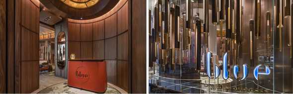 A wood-panelled foyer, with not even a hint of blue, opens into a lounge in wood, cream and brown leather with a champagne bar