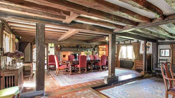 The magnificent dining room with an inglenook  